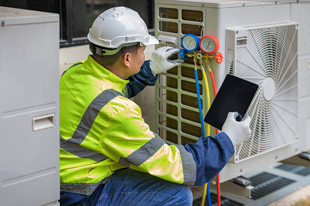 Professional Hvac technician working in Siluria, AL